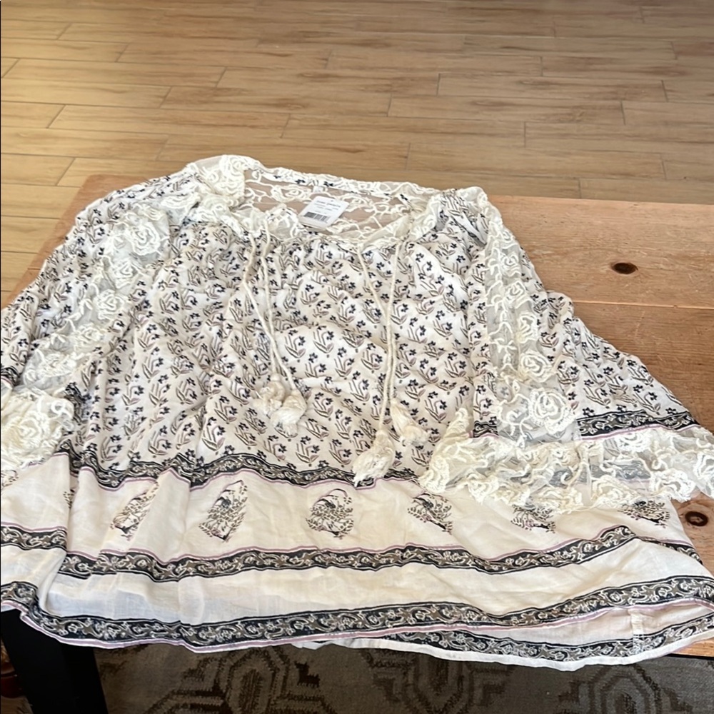 Free People long sleeve Ivory Combo lace and print draped top. size L.